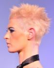Very short haircut with spikes for women