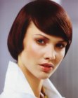Classy and sleek pageboy inspired hairstyle with curved bangs