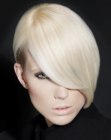 Short blonde hair with sleek and silky styling