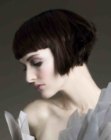 Short hairstyle with soft layers and a shorter neck section