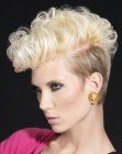 Short 1980s inspired hairstyle with tapered sides and back