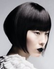 Asian bob hairstyle with sides that lengthen towards the face
