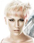 Punked up blonde pixie cut with pink streaks