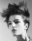 Punk hairstyle with short sides and spikes for women