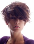Short layered hair styled for a windblown look