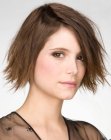 Brunette bob with ends that bend outward for volume