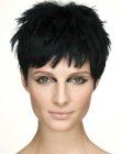 Black hair cut into an attractive pixie cut with layers
