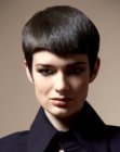 Short back and sides haircut with curved bangs for women