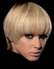 Modern bowl cut inspired by the 1960s Purdey hairstyle