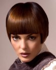 Short bob with clean cutting lines and blunt bangs