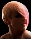 Short asymmetrical haircut with a combination of different hair colors
