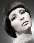 Bowl-cut inspired bob with a smooth curved cutting line