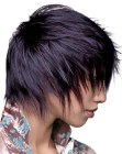 Fun haircut with pointed layers that cover the neckline