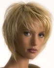 Short haircut with heavy layering that frames the face