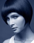 Sleek short bob with hair that clings to the face and neck