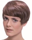 Short 1950s inspired hairstyle with sideburns for women