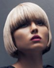 Blonde bob haircut with bangs and simple cutting lines