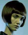 Glossy short bob with clean cutting lines and tapered ends