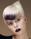 Short blonde hair with a purple traingle