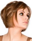 Chin-level bob cut with clean linesa and bulk on top of the head