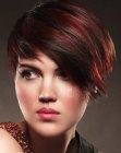 Short hairstyle with the hair styled diagonally across the face