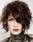 Short angled bob with deconstructed waves and styling for a tousled effect