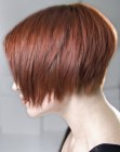 Jaw length bob with razor cutting and a side part