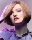 Short beveled bob with an almost shoulder length extension