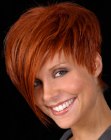 Short red hair with a graduated back and more length towards the front