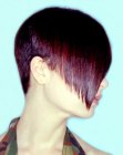 Asymmetric women's haircut with buzzed back and sides