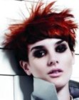 Short red hair with rounded bangs and spikes