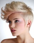 Hairstyle with tomboy short sides and longer curled top hair