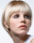 Retro 1960s inspired short haircut with a round shape