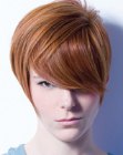 Short red hair with long bangs and snug sides