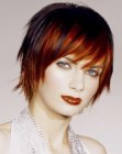 Short haircut with texture and choppy layers for a redhead