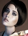 Short haircut with a sculpted contour and light asymmetry