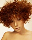 Short copper color hair with curls and waves