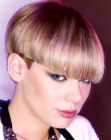 Blonde mushroom cut with a triangle shape undercut