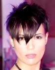 Powerful short haircut with strong angles and spikes