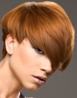 Sporty short hairdo with a graduated back and longer top hair
