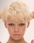 Short blonde hair with heavily textured bangs