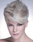 Blonde pixie cut with lifted roots for volume