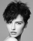 Razor-cut pixie with very short sides