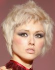 Chin length haircut with rough edges and a short fringe