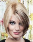 Chin length bob with an off center part and a smooth curve
