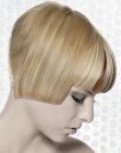 Women's haircut with a short buzzed nape