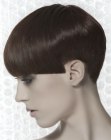 Short haircut with a buzzed neck section for women