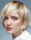 Soft and romantic chin length haircut with flipped tips