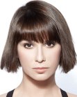 Short on trend haircut with textured blunt cut sides