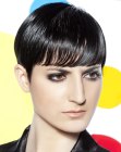 Pixie cut with slick wet look styling